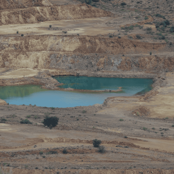 Turquois colored pitlake at Copper Flat Mine.  The beautiful color comes from pollutants.