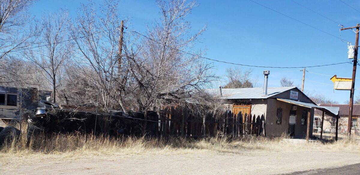 Photo of the Diamond Bar in Winston NM, a dilapidated building with caved-in awning