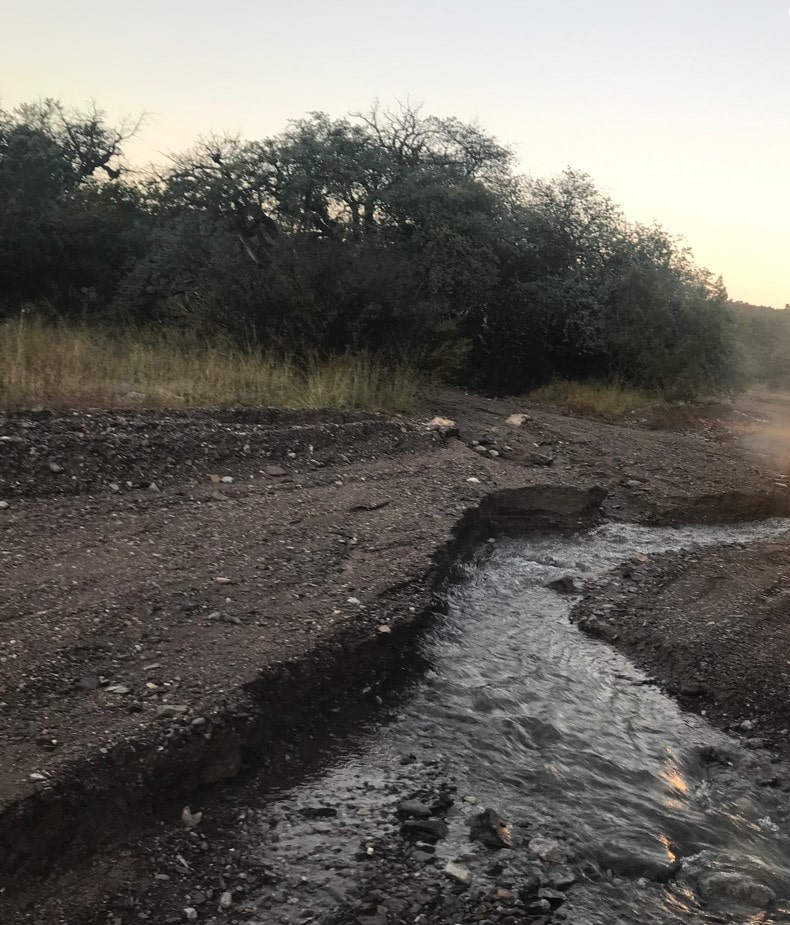 Flood-damaged road in Black Range