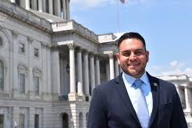 Gabe Vasquez in front of Capitol