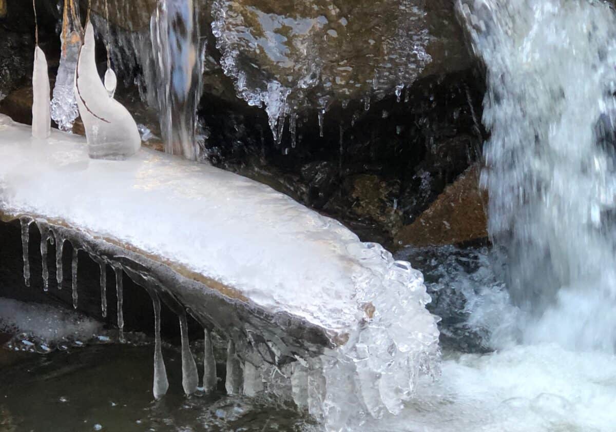 ice sculptures, icicles  and rushing water.