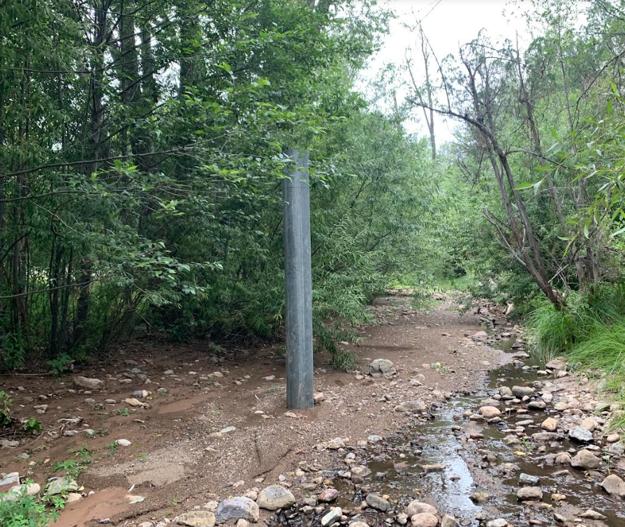 New fence post in Percha Creek