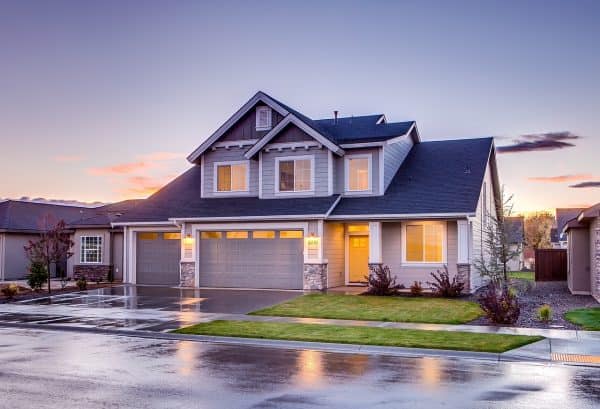 Two-story home with three garages.