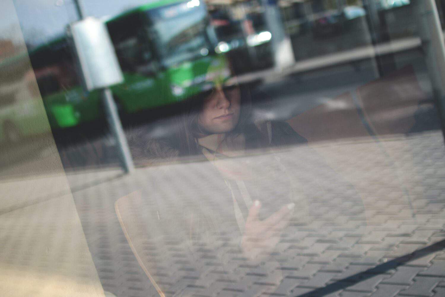 woman reading while waiting